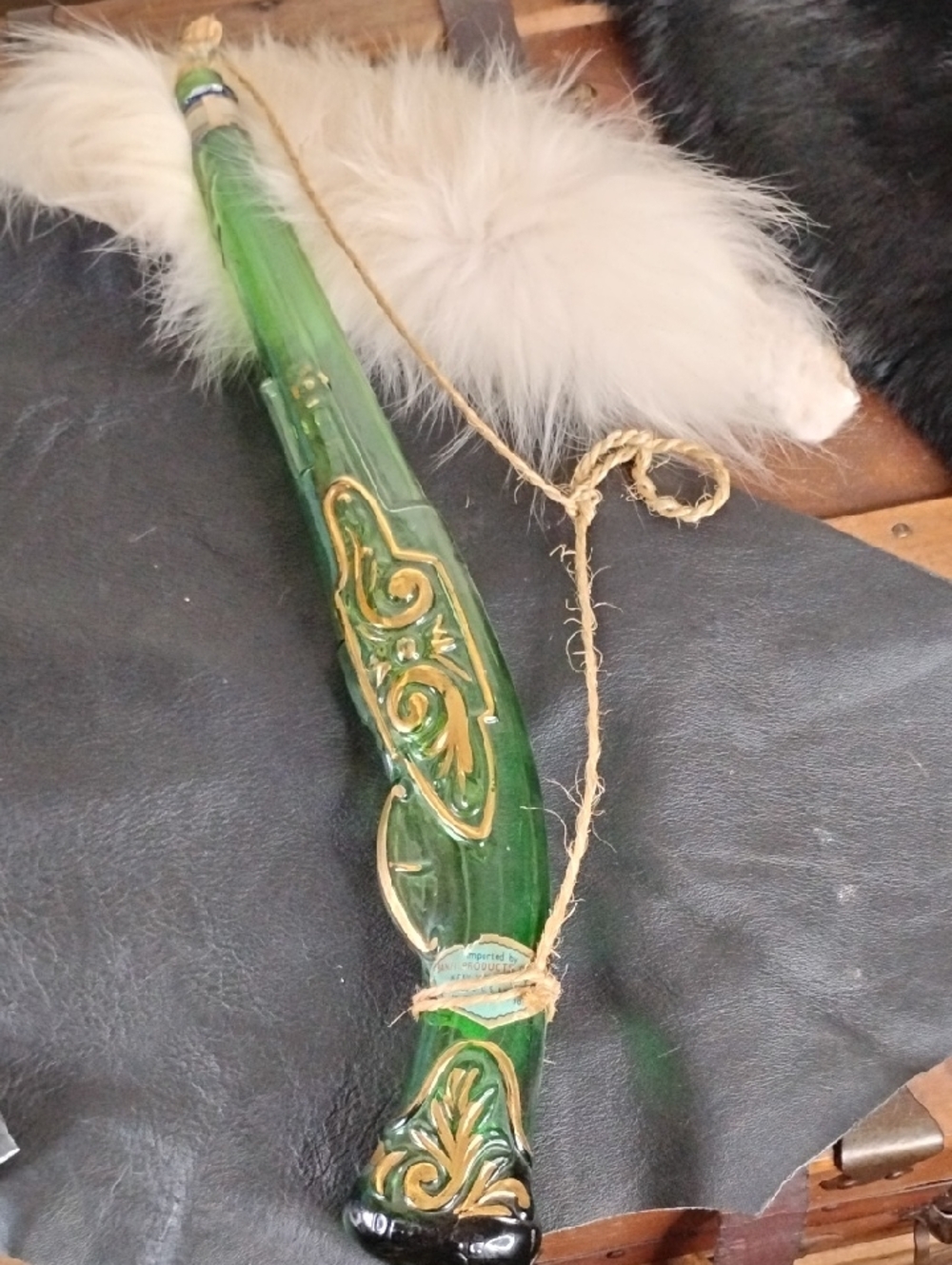 Barsotyine Green Glass Gun Bottle with Gold Accents